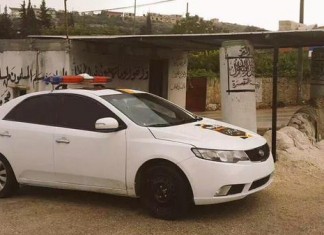 Sirija: Šerijatska policija Džebhetun-nusre Policijsko vozilo Nusrine šerijatske policije koja djeluje pod upravom šerijatskog suda u Idlibu